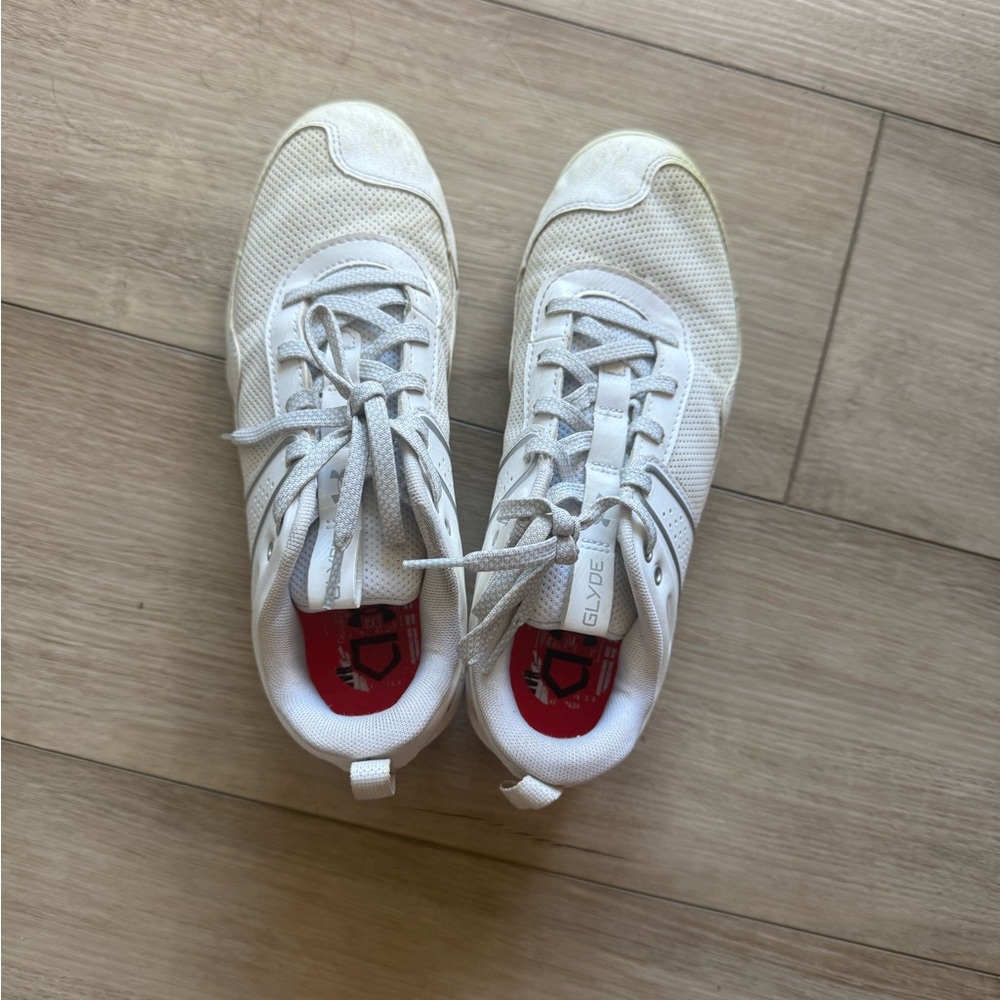 Women’s Athletic cleats (gently used for one season)